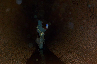 inside a 30,000 gallon water tank